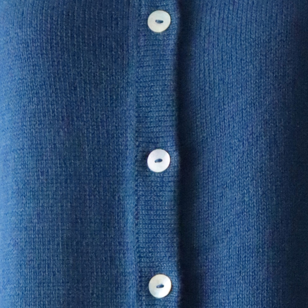 Women's classic cardigan with crew neck and button closure. Made in Peru by PFL knitwear Women's classic cardigan with crew neck and button closure. Made in Peru by PFL knitwear