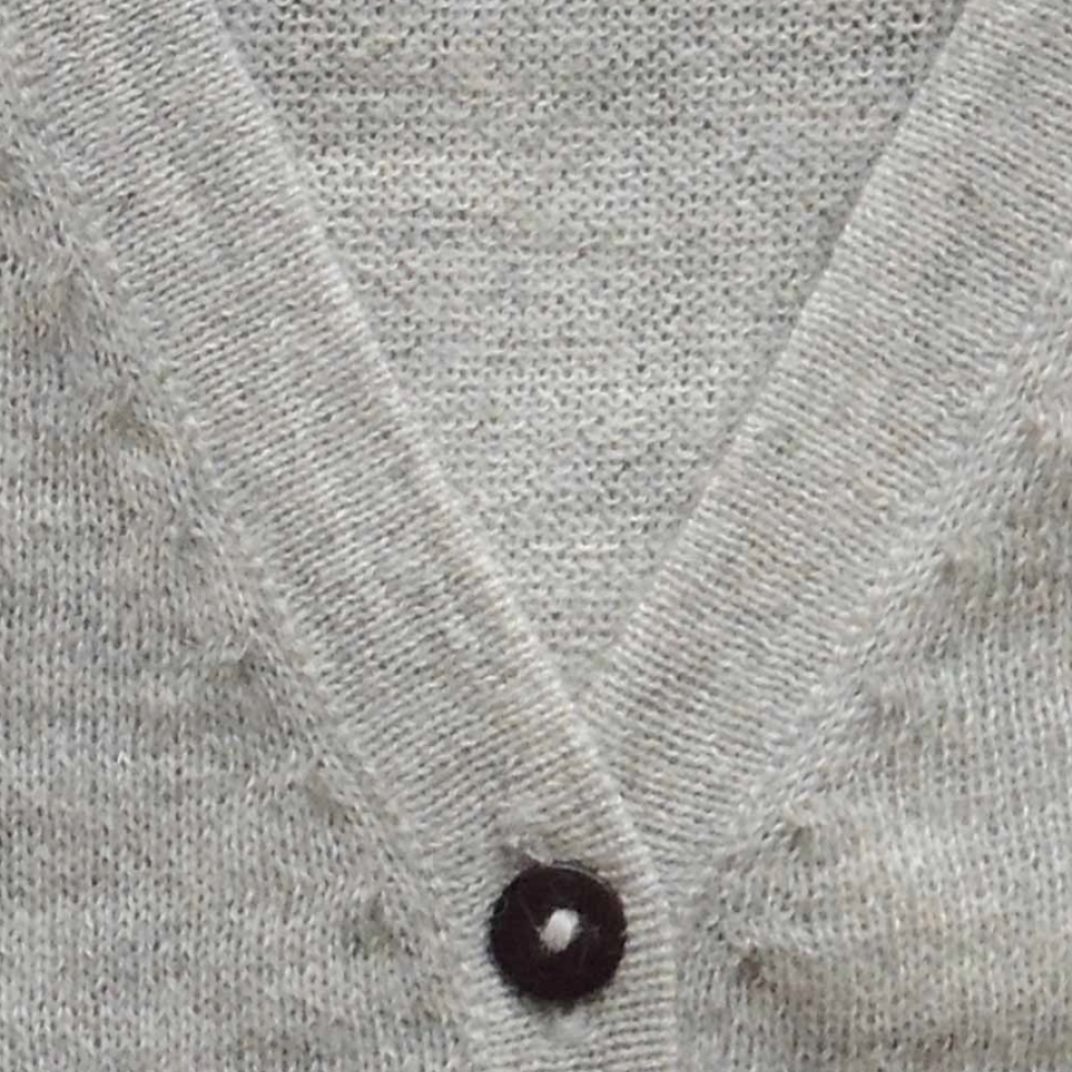 Women's cardigan baby alpaca 100%, with 14 buttons closure. Made in Peru by PFL knitwear Women's cardigan baby alpaca 100%, with 14 buttons closure. Made in Peru by PFL knitwear