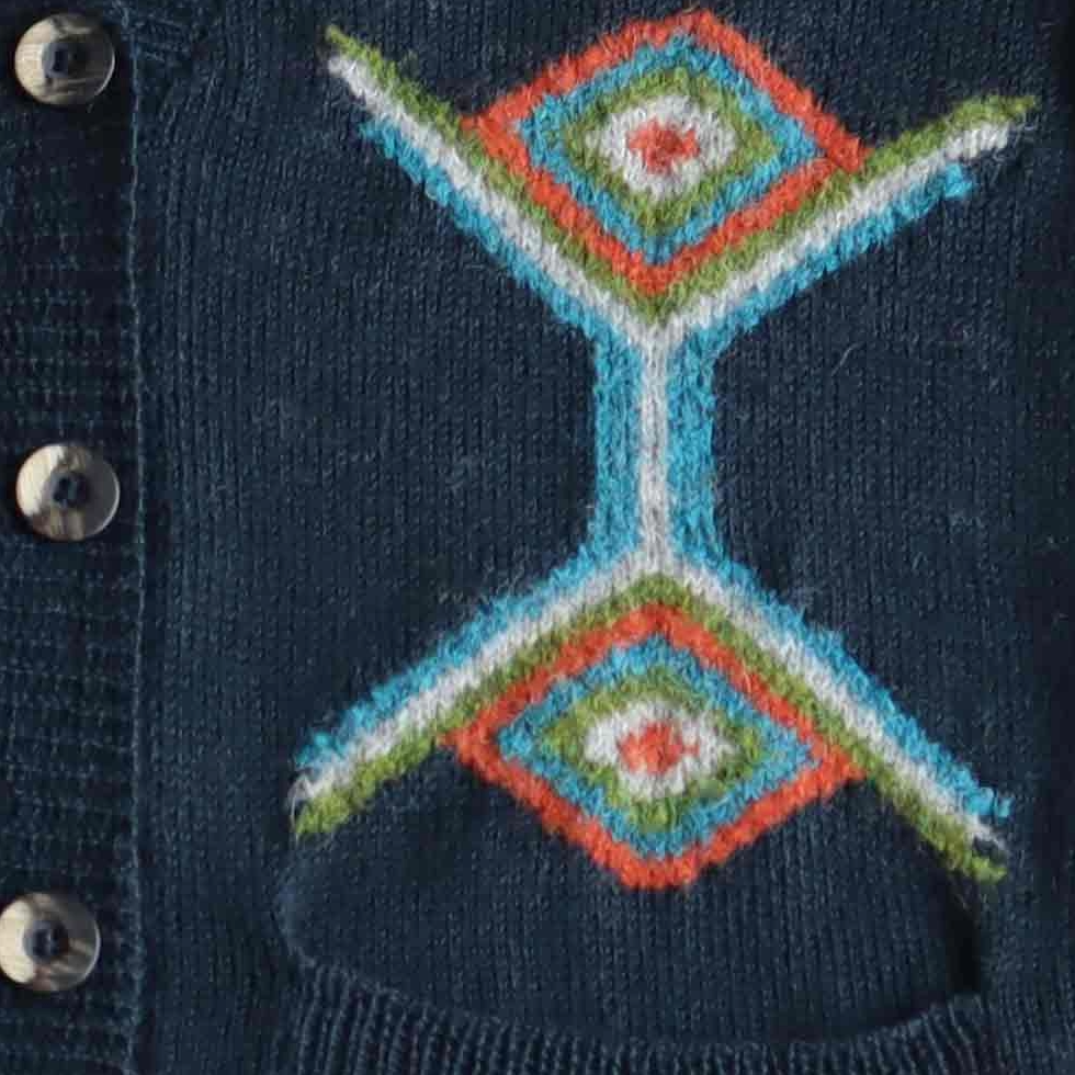 Women's cardigan baby alpaca, intarsia knitted with geometric pattern. Made in Peru by PFL knitwear Women's cardigan baby alpaca, intarsia knitted with geometric pattern. Made in Peru by PFL knitwear