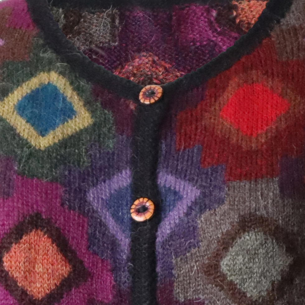 Women's cardigan hand intarsia knitted 100% alpaca, with diamond pattern. Made in Peru by PFL knitwear Women's cardigan hand intarsia knitted 100% alpaca, with diamond pattern. Made in Peru by PFL knitwear