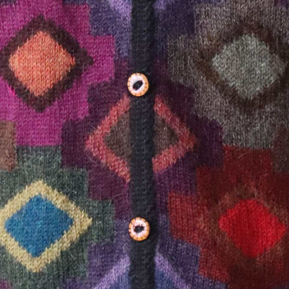 Women's cardigan hand intarsia knitted 100% alpaca, with diamond pattern. Made in Peru by PFL knitwear Women's cardigan hand intarsia knitted 100% alpaca, with diamond pattern. Made in Peru by PFL knitwear