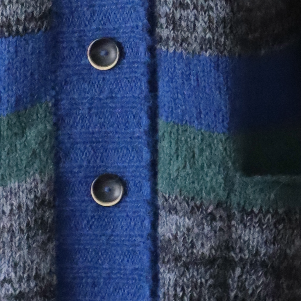 Women's cardigan made from a soft brushed alpaca blend yarn. Made in Peru by PFL knitwear Women's cardigan made from a soft brushed alpaca blend yarn. Made in Peru by PFL knitwear