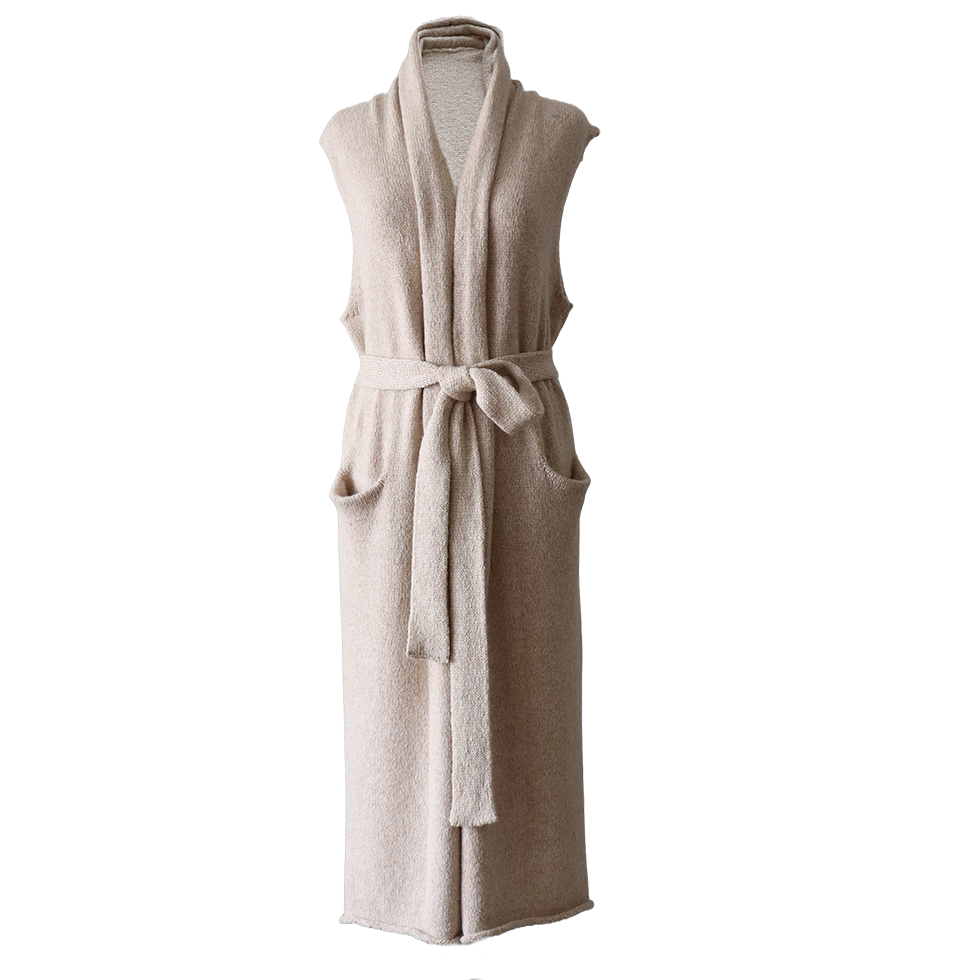 Women's long sleeveless cardigan felted, color oatmeal, natural yarns. Made in Peru by PFL knitwear Women's long sleeveless cardigan felted, color oatmeal, natural yarns. Made in Peru by PFL knitwear