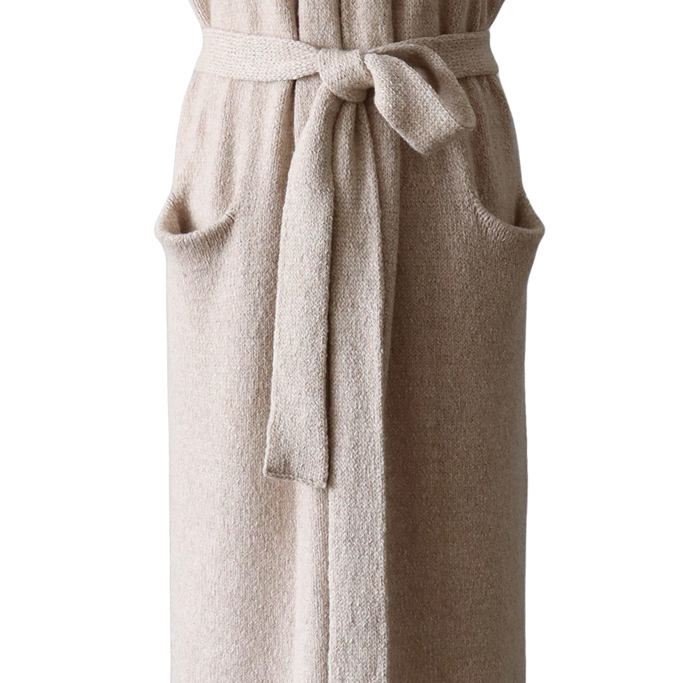 Women's long sleeveless cardigan felted, color oatmeal, natural yarns. Made in Peru by PFL knitwear Women's long sleeveless cardigan felted, color oatmeal, natural yarns. Made in Peru by PFL knitwear