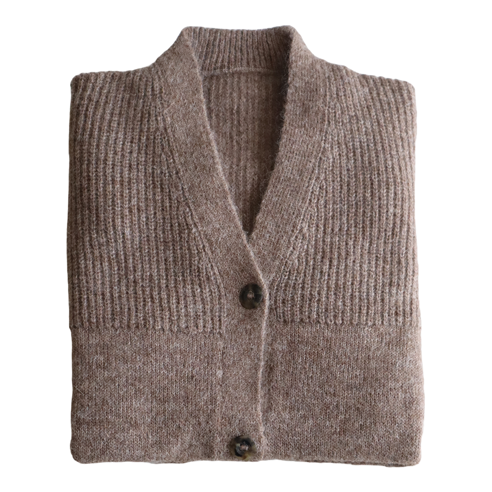 Women's soft brushed alpaca cardigan with V-neck and button closure. Made in Peru by PFL knitwear Women's soft brushed alpaca cardigan with V-neck and button closure. Made in Peru by PFL knitwear