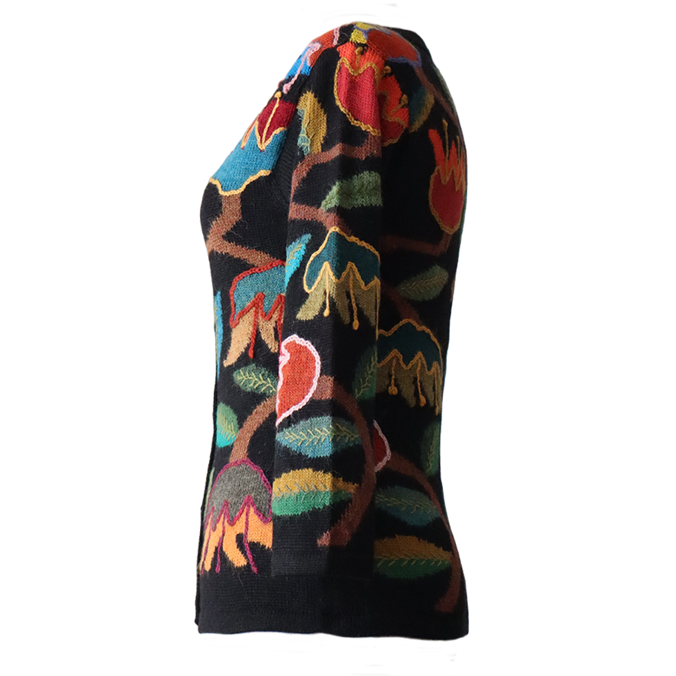Women's cardigan alpaca intarsia knitted flower pattern. Made in Peru by PFL knitwear Women's cardigan alpaca intarsia knitted flower pattern. Made in Peru by PFL knitwear