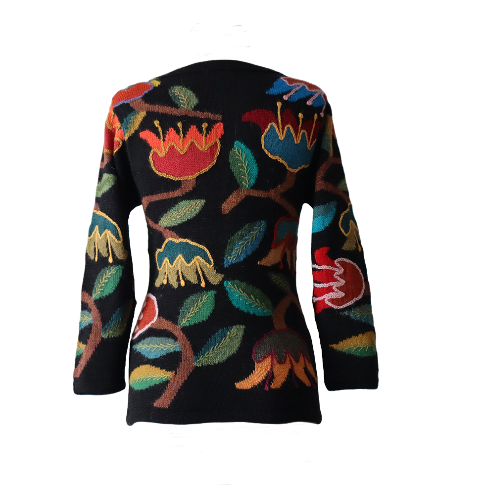 Women's cardigan alpaca intarsia knitted flower pattern. Made in Peru by PFL knitwear Women's cardigan alpaca intarsia knitted flower pattern. Made in Peru by PFL knitwear