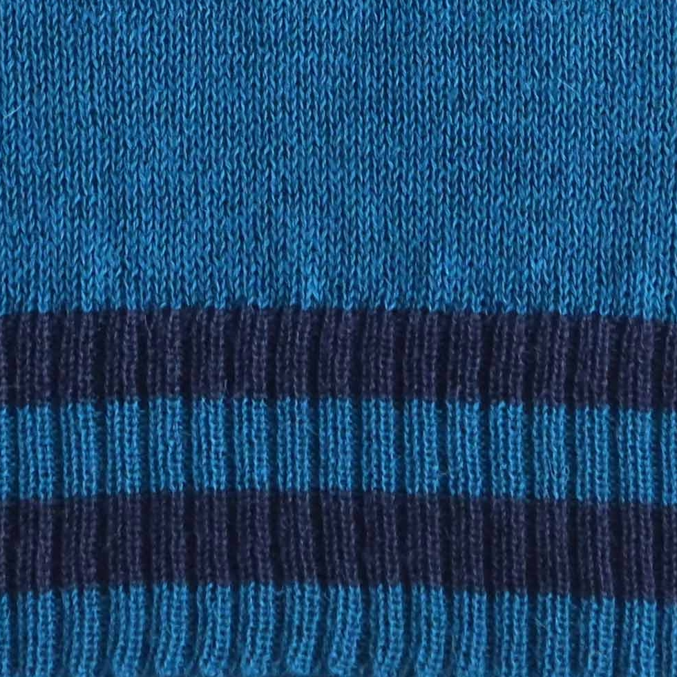 Women's sleeveless sweater 100% royal alpaca color blue with stripes. Made in Peru by PFL knitwear Women's sleeveless sweater 100% royal alpaca color blue with stripes. Made in Peru by PFL knitwear