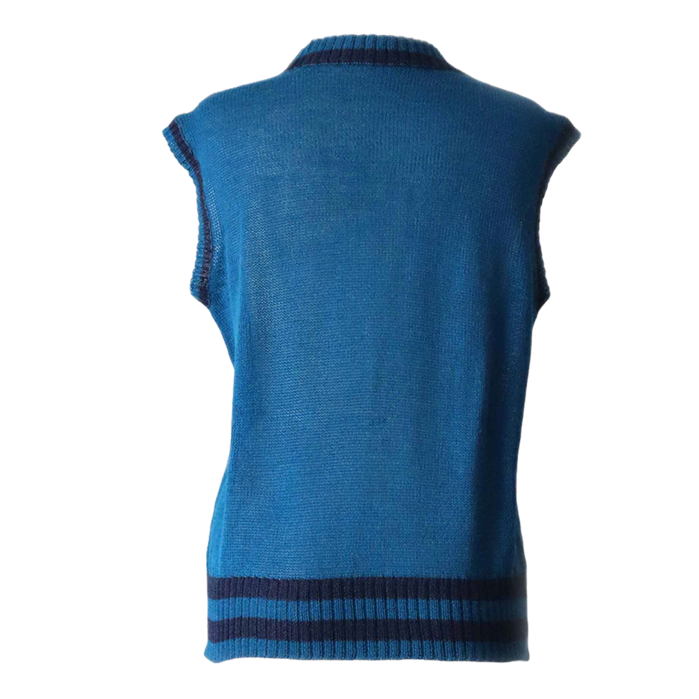 Women's sleeveless sweater 100% royal alpaca color blue with stripes. Made in Peru by PFL knitwear Women's sleeveless sweater 100% royal alpaca color blue with stripes. Made in Peru by PFL knitwear