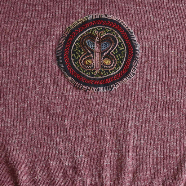 Women's sweater, with stitched embroidered detail on the back side. Made in Peru by PFL knitwear