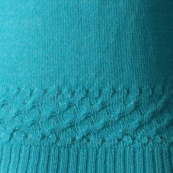 Women's sweater, with crew neck and cable details at the bottom edge. Made In Peru by PFL knitwear
