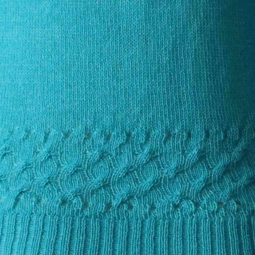 Women's sweater, with crew neck and cable details at the bottom edge. Made In Peru by PFL knitwear Women's sweater, with crew neck and cable details at the bottom edge. Made In Peru by PFL knitwear