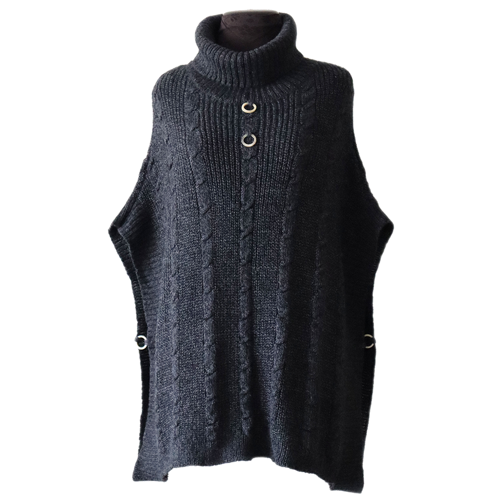 Poncho with a classic cable pattern baby alpaca or alpaca blend. Made in Peru by PFL Knitwear Poncho with a classic cable pattern baby alpaca or alpaca blend. Made in Peru by PFL Knitwear