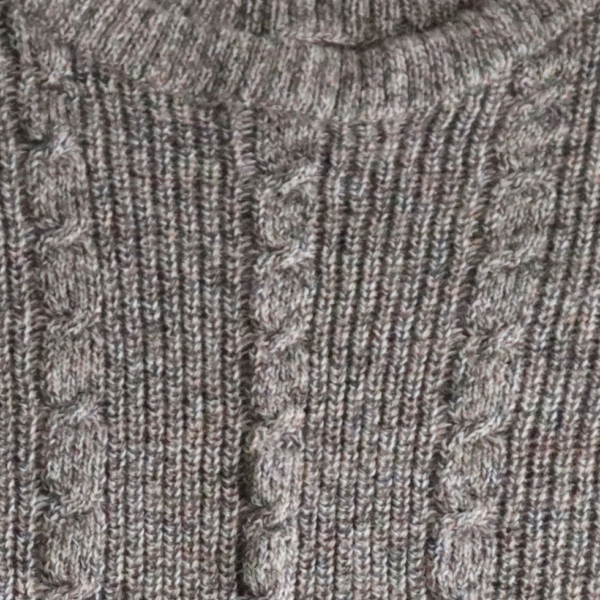 Poncho with a classic cable pattern baby alpaca or alpaca blend. Made in Peru by PFL Knitwear