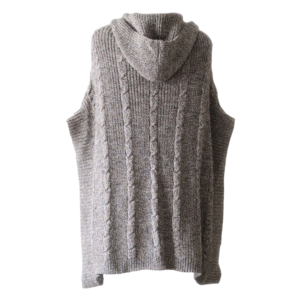 Poncho with a classic cable pattern baby alpaca or alpaca blend. Made in Peru by PFL Knitwear Poncho with a classic cable pattern baby alpaca or alpaca blend. Made in Peru by PFL Knitwear