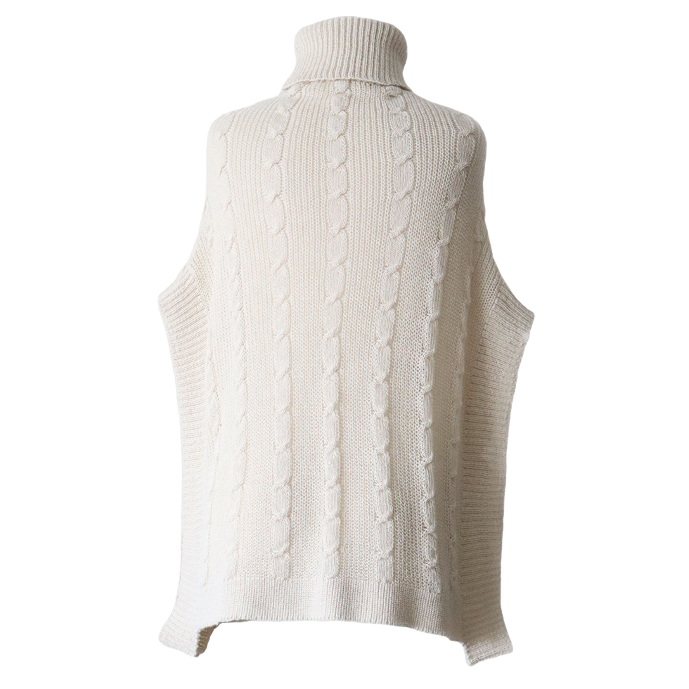 Poncho with a classic cable pattern baby alpaca or alpaca blend. Made in Peru by PFL Knitwear Poncho with a classic cable pattern baby alpaca or alpaca blend. Made in Peru by PFL Knitwear
