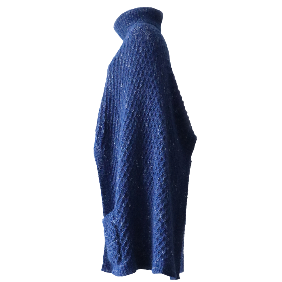 Poncho - Cape with turtleneck collar, pockets baby alpaca. Made in Peru by PFL knitwear Poncho - Cape with turtleneck collar, pockets baby alpaca. Made in Peru by PFL knitwear