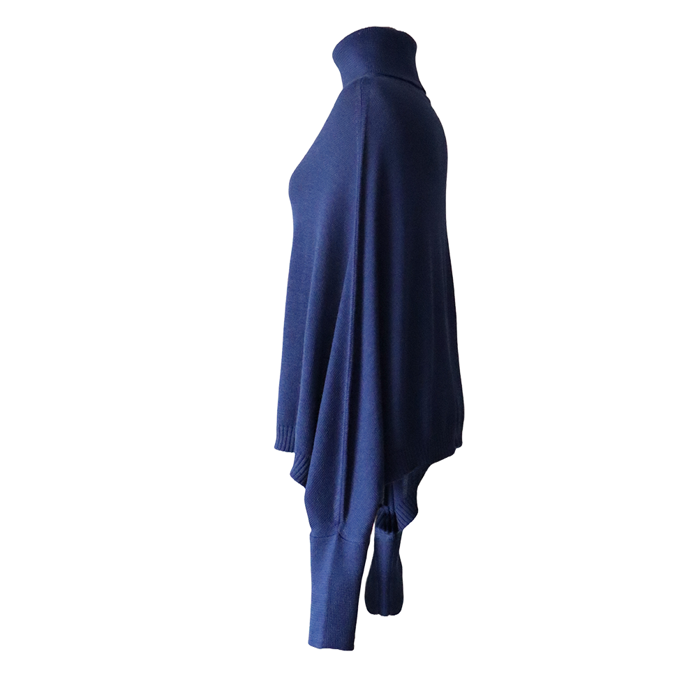 Poncho alpaca with sleeves and turtle neck, 100% baby or royal alpaca. Made in Peru by PFL knitwear Poncho alpaca with sleeves and turtle neck, 100% baby or royal alpaca. Made in Peru by PFL knitwear