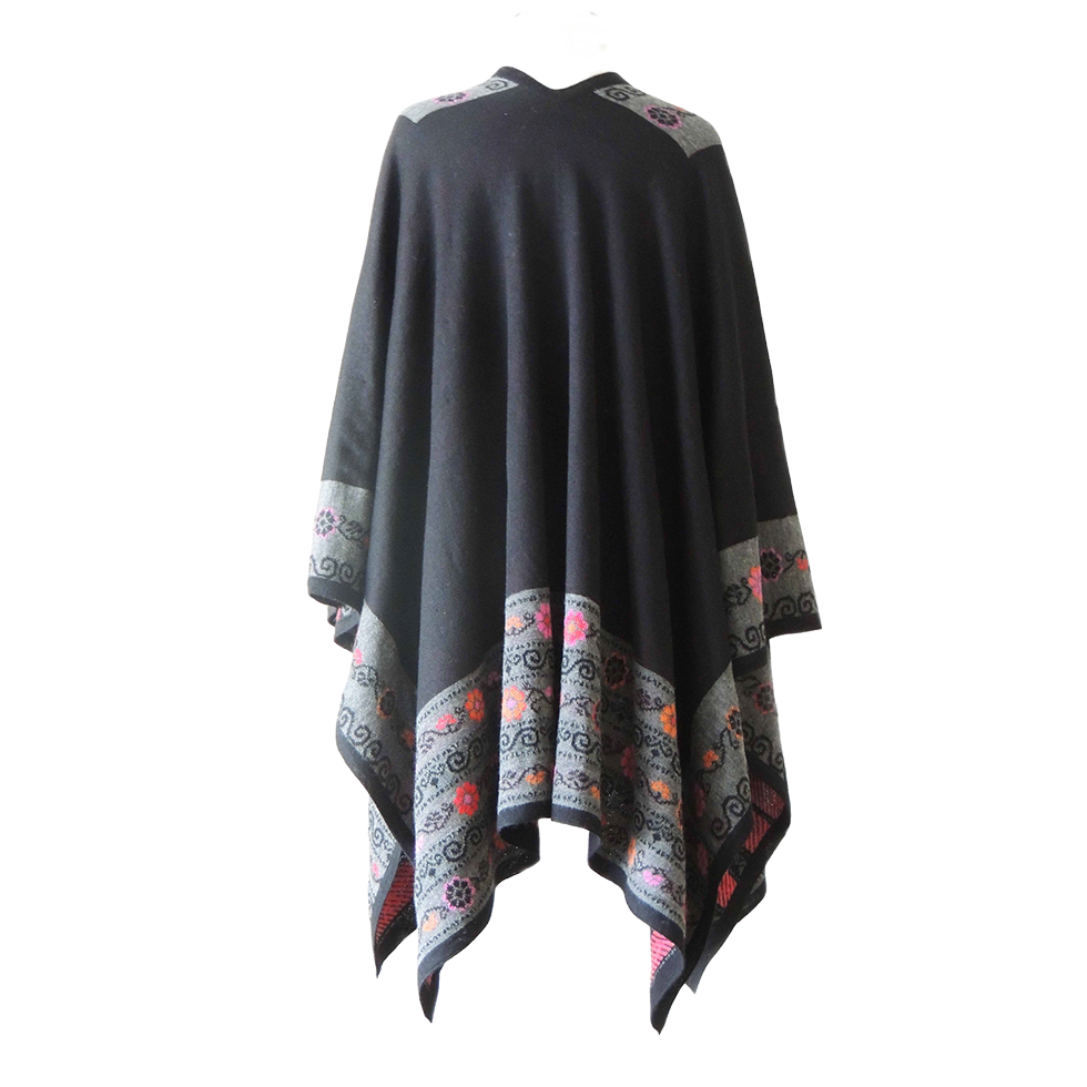 Ruana, wrap, baby alpaca, jacquard knitted with embroidered floral pattern. Made in Peru by PFL knitwear Ruana, wrap, baby alpaca, jacquard knitted with embroidered floral pattern. Made in Peru by PFL knitwear