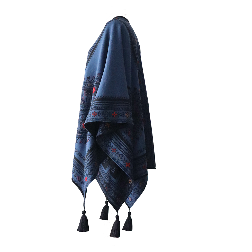 Ruana, wrap reversible, alpaca blend, jacquard knitted pattern, with tassels. Made in Peru by PFL knitwear Ruana, wrap reversible, alpaca blend, jacquard knitted pattern, with tassels. Made in Peru by PFL knitwear
