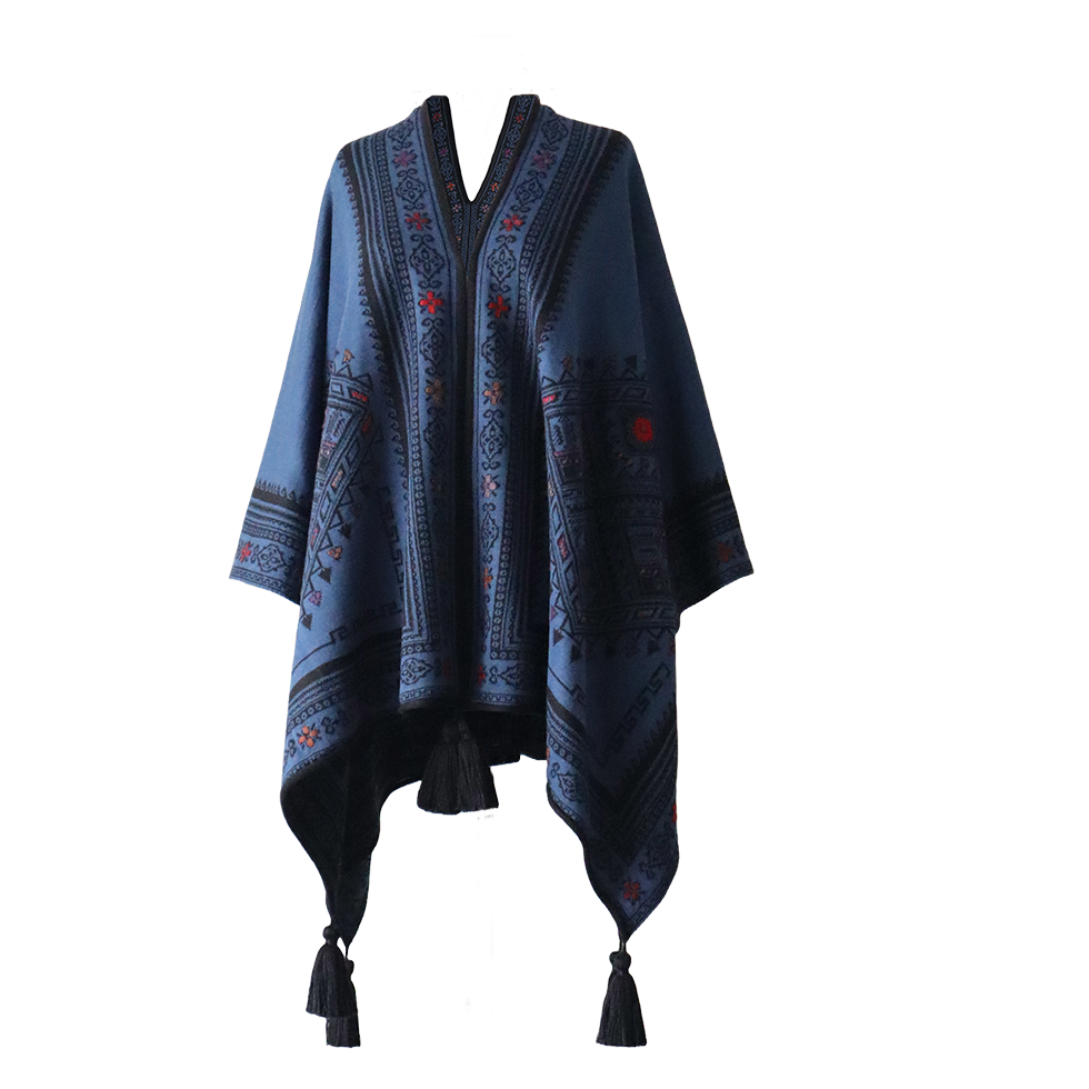 Ruana, wrap reversible, alpaca blend, jacquard knitted pattern, with tassels. Made in Peru by PFL knitwear Ruana, wrap reversible, alpaca blend, jacquard knitted pattern, with tassels. Made in Peru by PFL knitwear