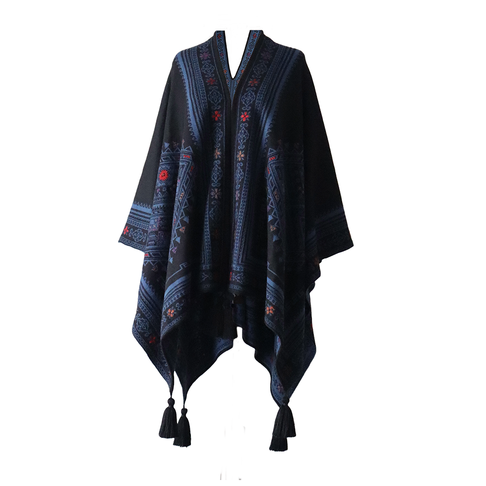 Ruana, wrap reversible, alpaca blend, jacquard knitted pattern, with tassels. Made in Peru by PFL knitwear Ruana, wrap reversible, alpaca blend, jacquard knitted pattern, with tassels. Made in Peru by PFL knitwear