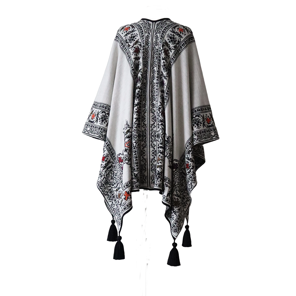 Ruana, wrap reversible, alpaca blend, jacquard knitted pattern, with tassels. Made in Peru by PFL knitwear Ruana, wrap reversible, alpaca blend, jacquard knitted pattern, with tassels. Made in Peru by PFL knitwear