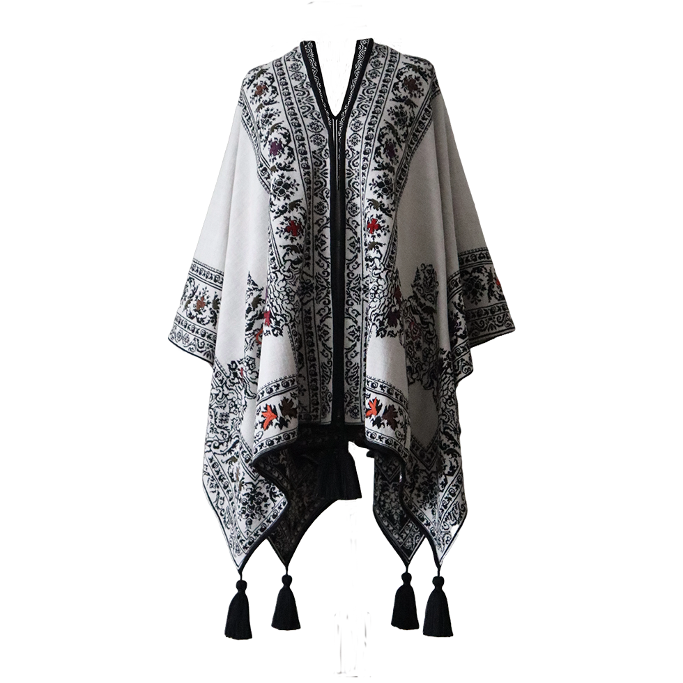 Ruana, wrap reversible, alpaca blend, jacquard knitted pattern, with tassels. Made in Peru by PFL knitwear Ruana, wrap reversible, alpaca blend, jacquard knitted pattern, with tassels. Made in Peru by PFL knitwear