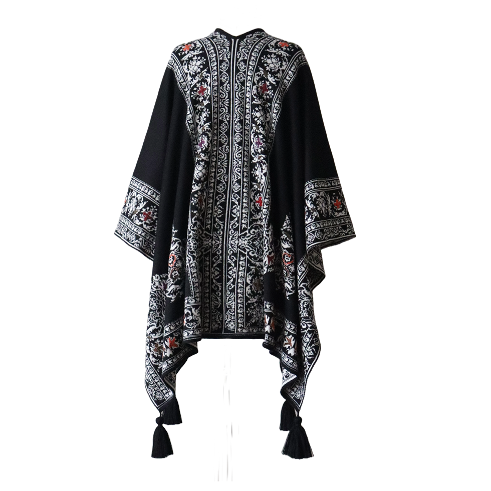 Ruana, wrap reversible, alpaca blend, jacquard knitted pattern, with tassels. Made in Peru by PFL knitwear Ruana, wrap reversible, alpaca blend, jacquard knitted pattern, with tassels. Made in Peru by PFL knitwear