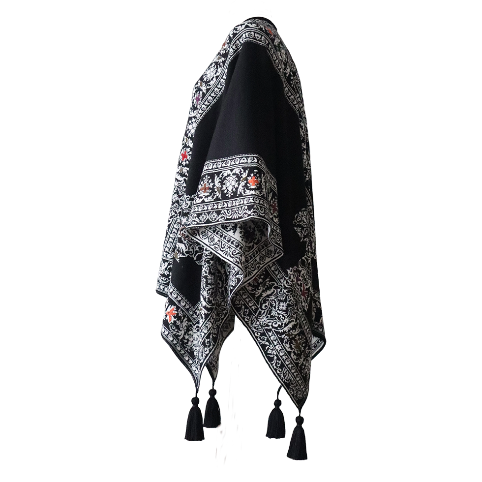 Ruana, wrap reversible, alpaca blend, jacquard knitted pattern, with tassels. Made in Peru by PFL knitwear Ruana, wrap reversible, alpaca blend, jacquard knitted pattern, with tassels. Made in Peru by PFL knitwear