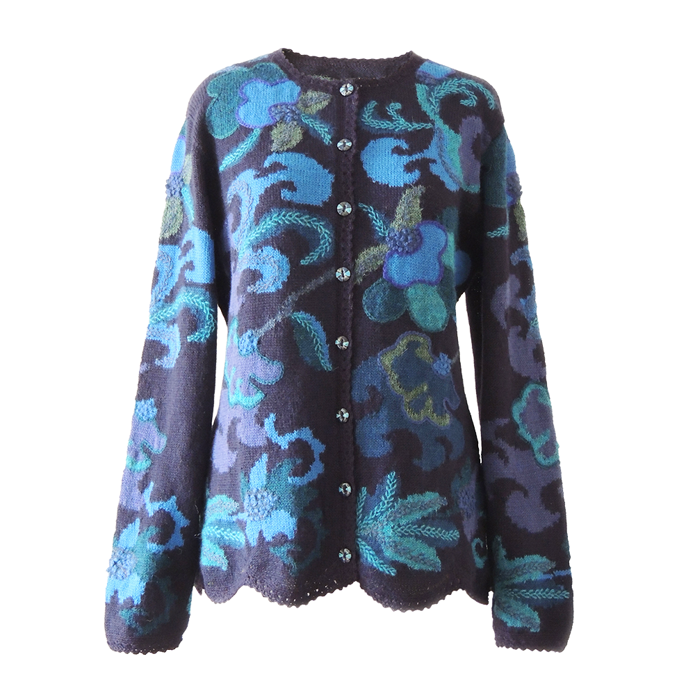 Women's alpaca cardigan Paracas, blue shades, Intarsia knitted with flower pattern. Women's alpaca cardigan Paracas, blue shades, Intarsia knitted with flower pattern.