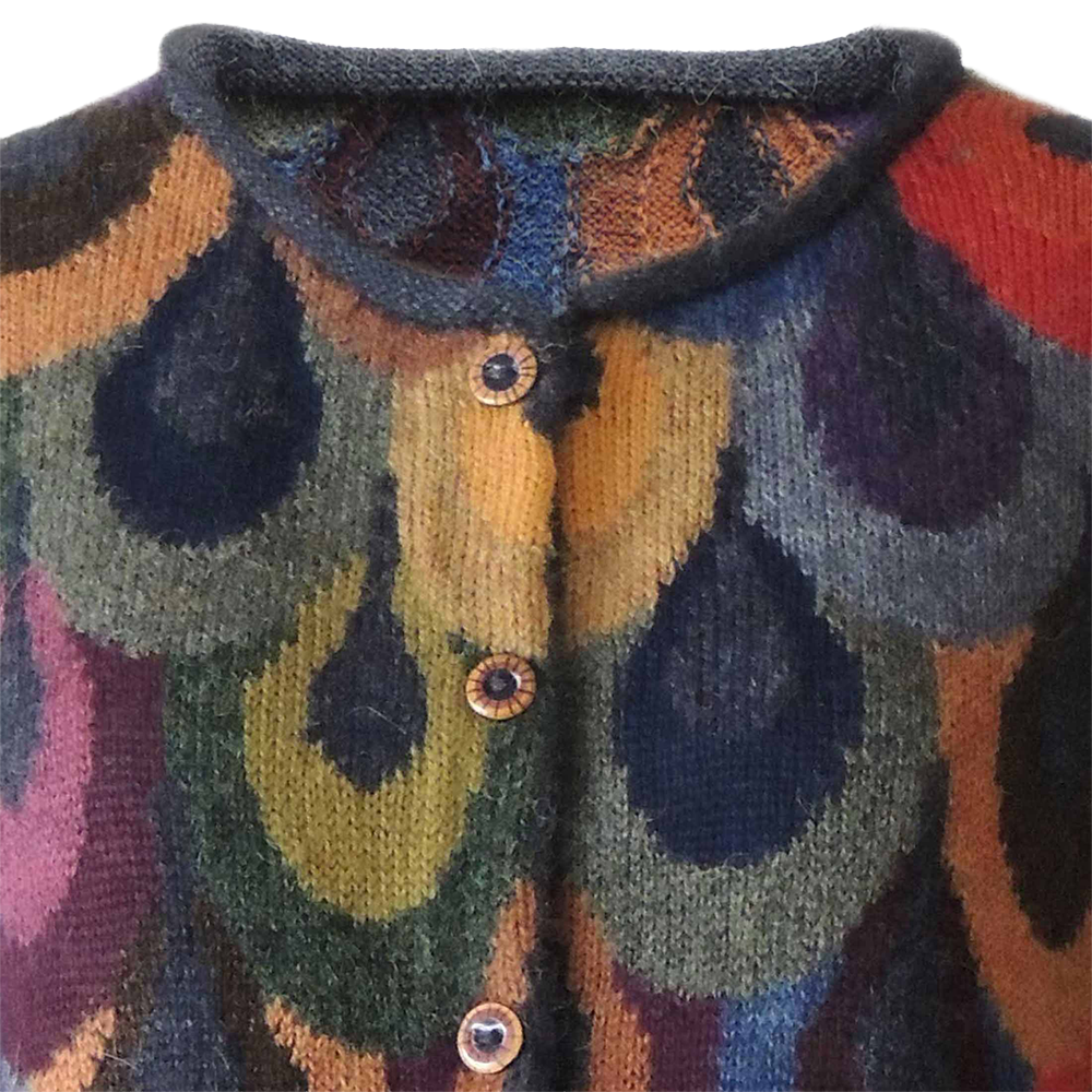 Women's alpaca cardigan peacock, multicolor Intarsia knitted with all over pattern. Made in Peru By PFL knitwear Women's alpaca cardigan peacock, multicolor Intarsia knitted with all over pattern. Made in Peru By PFL knitwear