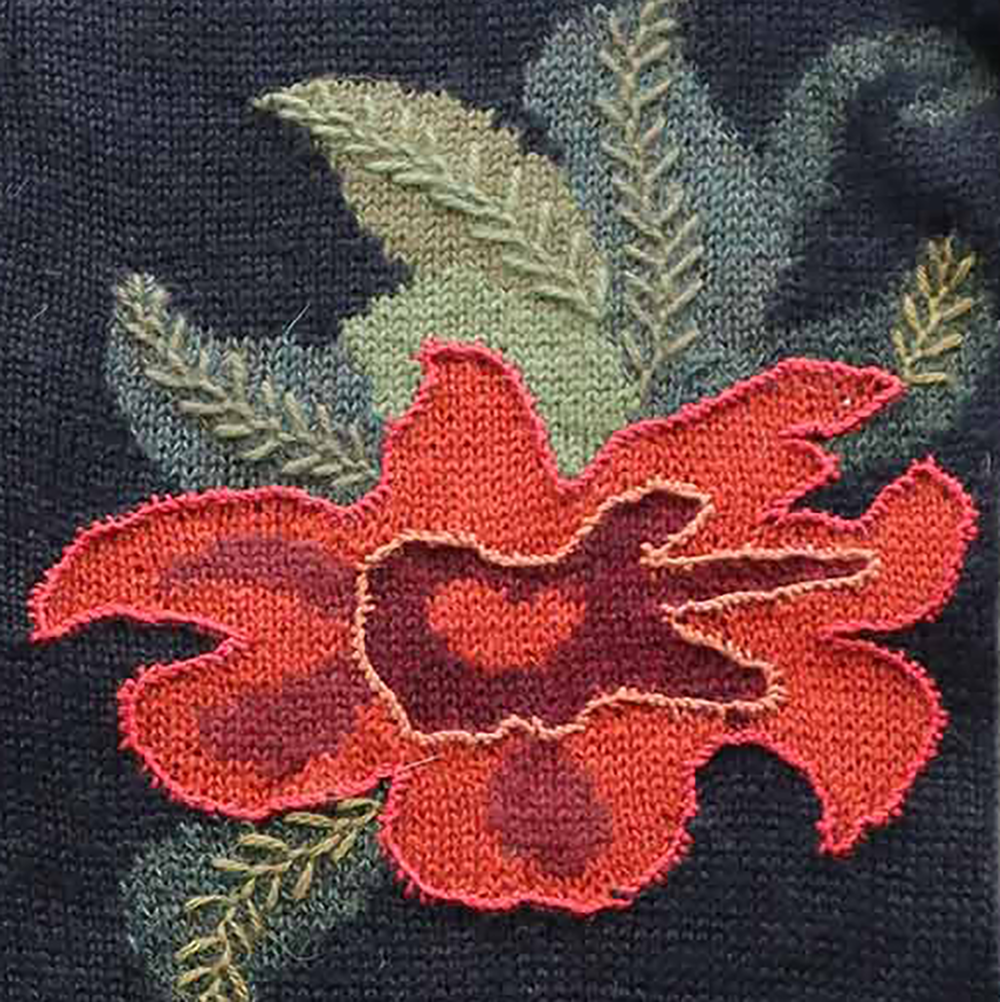 Women's alpaca cardigan Paclla, multicolor Intarsia knitted with flower pattern. Women's alpaca cardigan Paclla, multicolor Intarsia knitted with flower pattern.