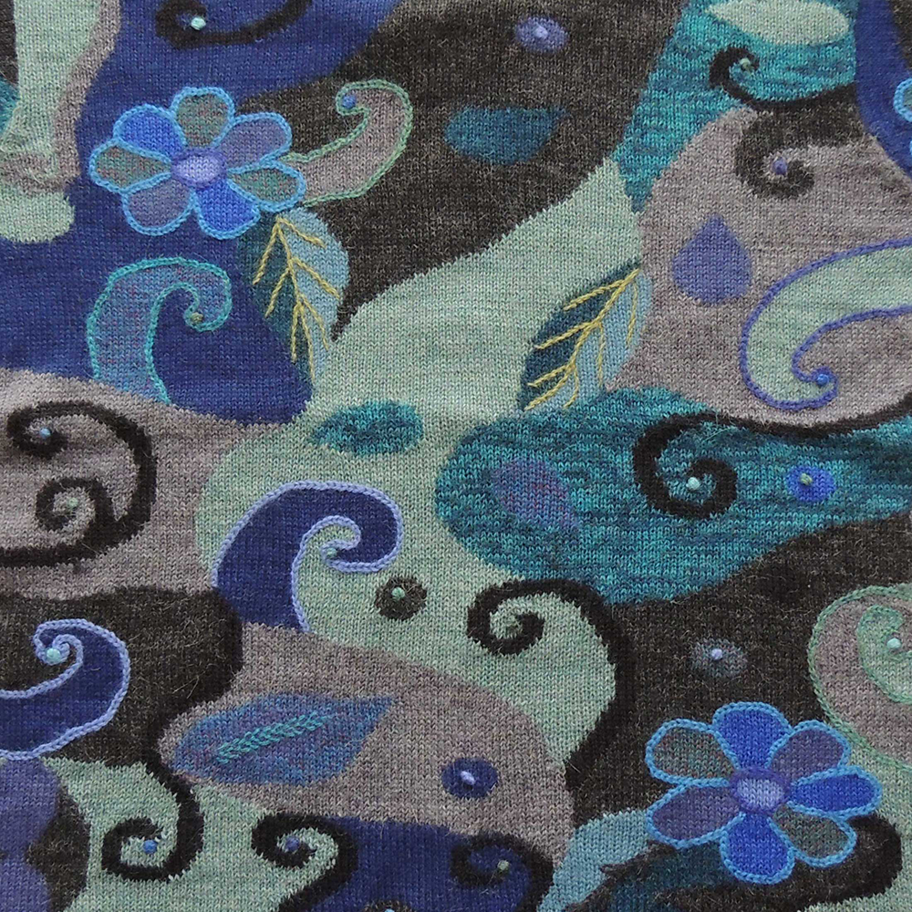 Women's alpaca cardigan Magdalena, multicolor Intarsia knitted with flower pattern. Women's alpaca cardigan Magdalena, multicolor Intarsia knitted with flower pattern.