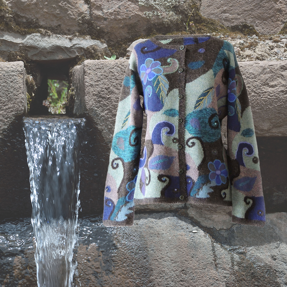 Women's alpaca cardigan Magdalena, multicolor Intarsia knitted with flower pattern. Women's alpaca cardigan Magdalena, multicolor Intarsia knitted with flower pattern.