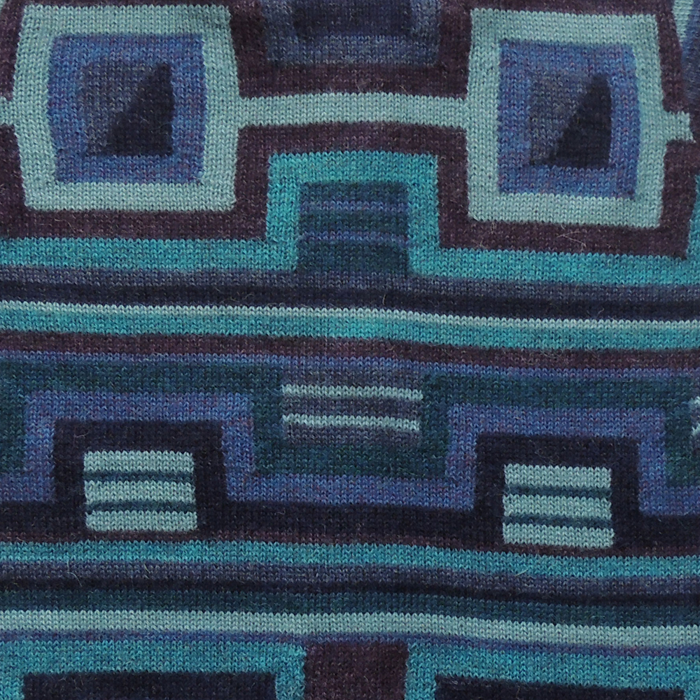 Women's alpaca cardigan Caiza, multicolor Intarsia knitted with flower pattern. Women's alpaca cardigan Caiza, multicolor Intarsia knitted with flower pattern.