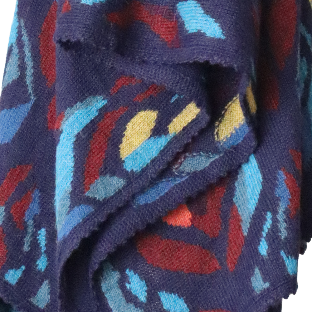 PFLknitwear.com/b2b/ Alpaca Ruana Wrap Tulipan with Colorful Intarsia Pattern, hand knitted. PFLknitwear.com/b2b/ Alpaca Ruana Wrap Tulipan with Colorful Intarsia Pattern, hand knitted.