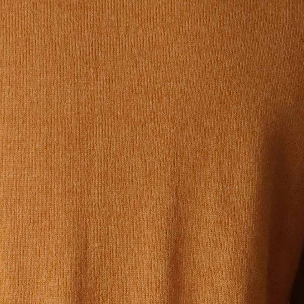 PFL knitwear Cardigan baby alpaca, vest baby alpaca with button closure and crew neck color ginger orange. PFL knitwear Cardigan baby alpaca, vest baby alpaca with button closure and crew neck color ginger orange.
