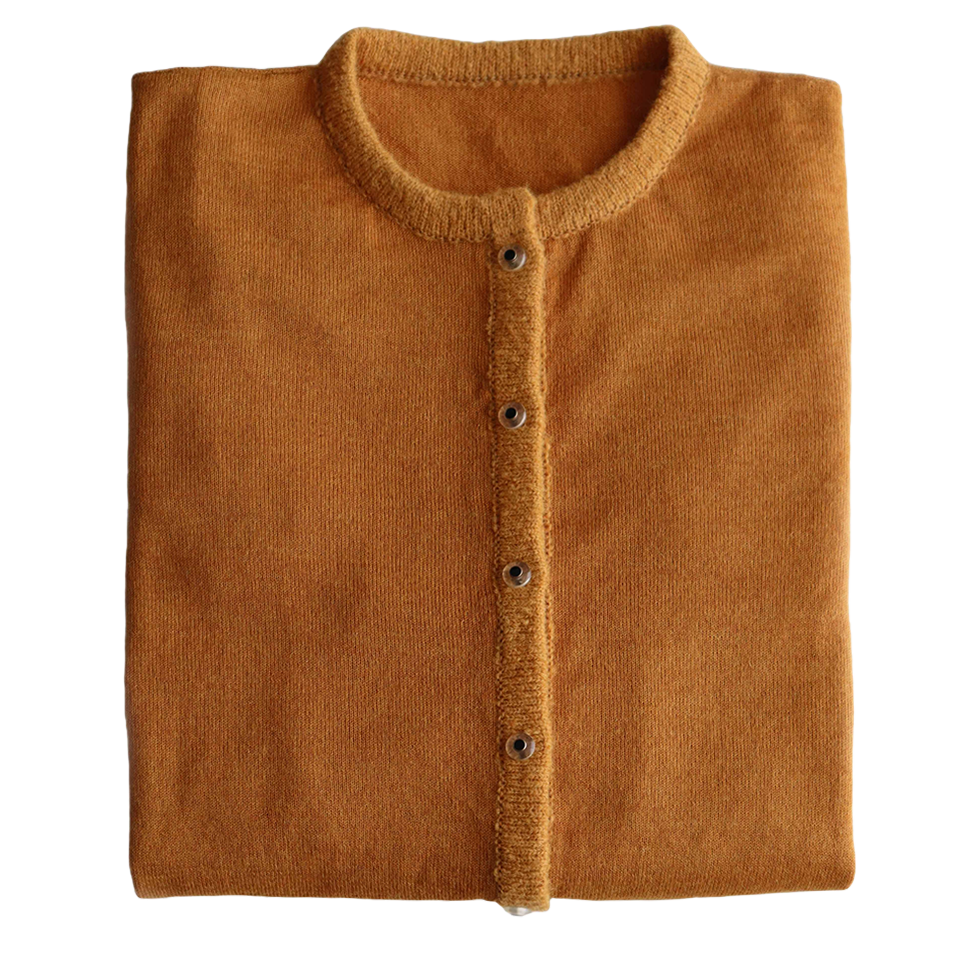 PFL knitwear Cardigan baby alpaca, vest baby alpaca with button closure and crew neck color ginger orange. PFL knitwear Cardigan baby alpaca, vest baby alpaca with button closure and crew neck color ginger orange.