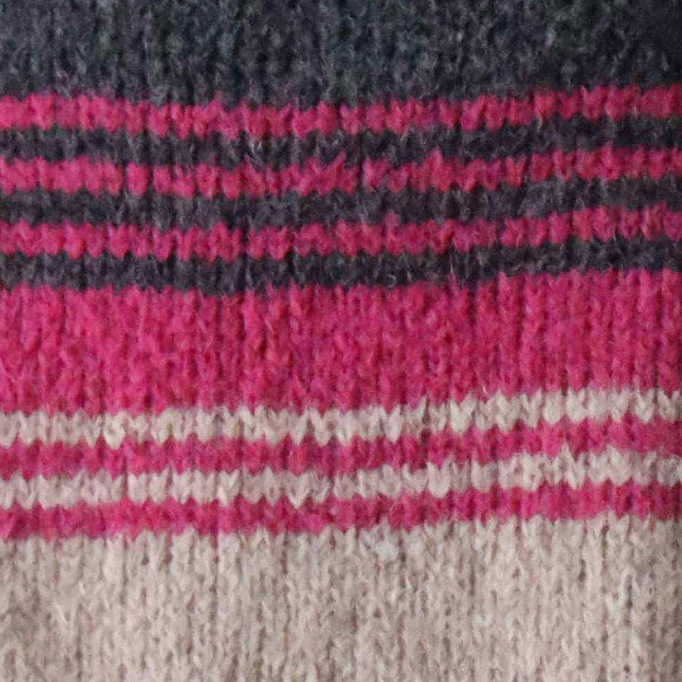 pflknitwear.com Women's sweater made from an alpaca blend yarn, with a soft brushed texture and a stripe design featuring three different colors.