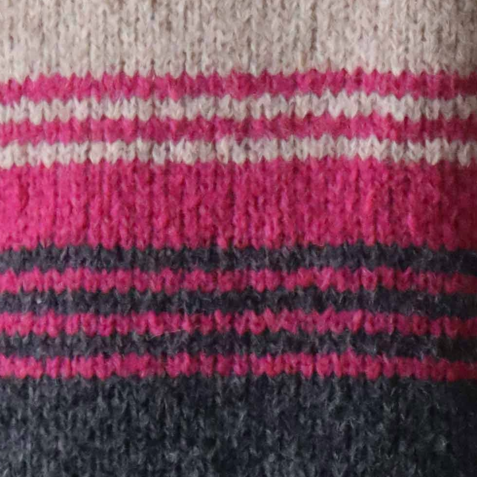 pflknitwear.com Women's sweater made from an alpaca blend yarn, with a soft brushed texture and a stripe design featuring three different colors.
