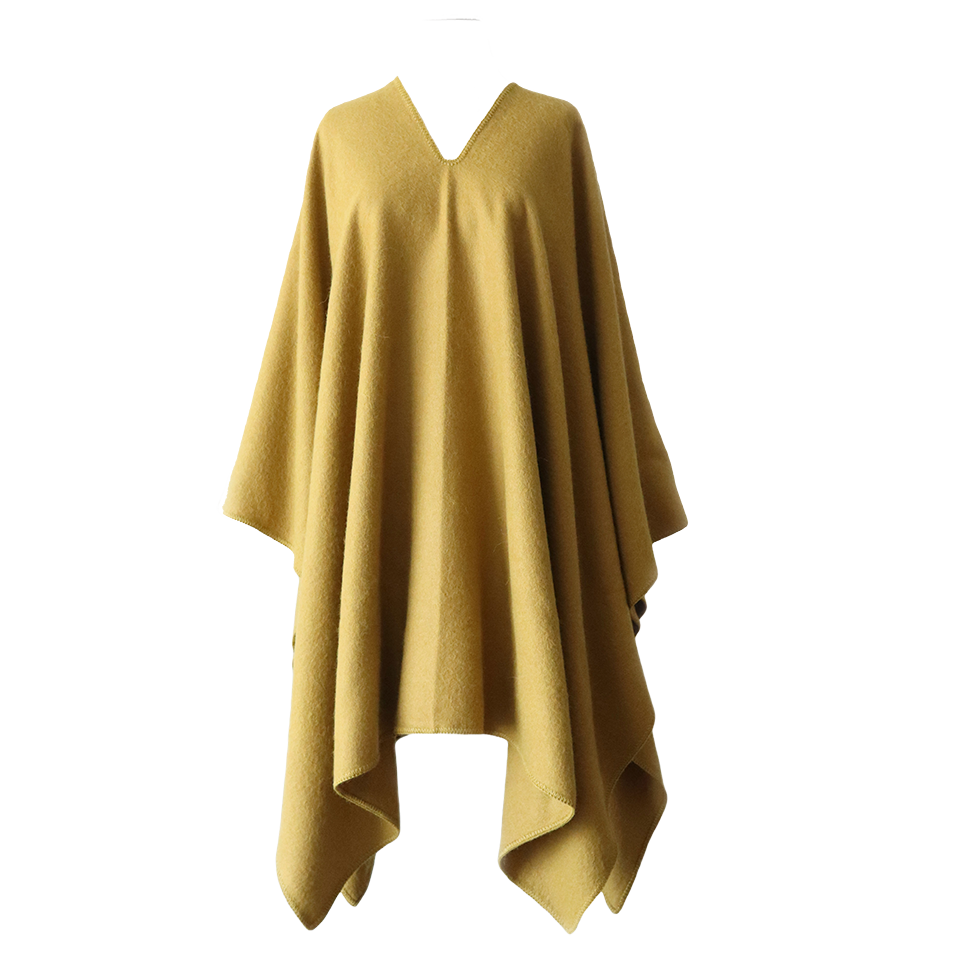 pflknitwear.com Poncho classic knitted model, felted solid color with V-neck. pflknitwear.com Poncho classic knitted model, felted solid color with V-neck.