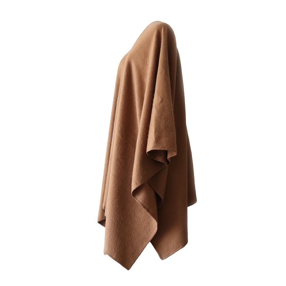 pflknitwear.com Poncho classic knitted model, felted solid color with V-neck. pflknitwear.com Poncho classic knitted model, felted solid color with V-neck.