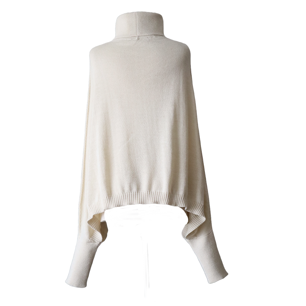 pflknitwear.com Poncho with sleeves and turtle neck, 100% baby alpaca color white pflknitwear.com Poncho with sleeves and turtle neck, 100% baby alpaca color white