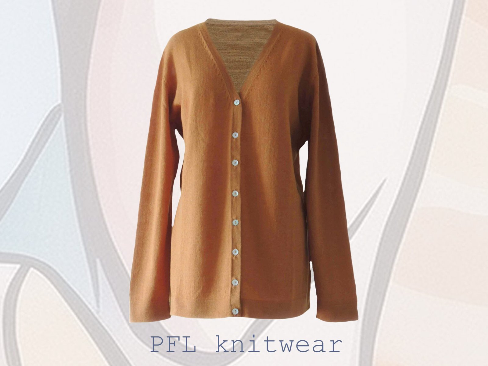Women's cardigan baby alpaca 100%, V-neck cardigan with button closure, color sandstone orange made in Peru by PFL knitwear Women's cardigan baby alpaca 100%, V-neck cardigan with button closure, color sandstone orange made in Peru by PFL knitwear