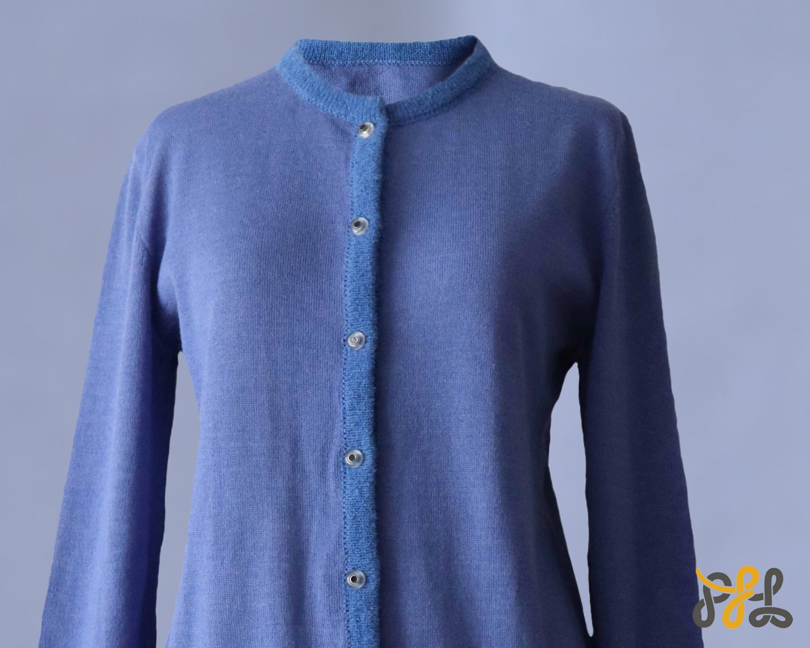 Cardigan baby alpaca, vest with button closure and crew neck color blue. made in Peru by PFL knitwear Cardigan baby alpaca, vest with button closure and crew neck color blue. made in Peru by PFL knitwear