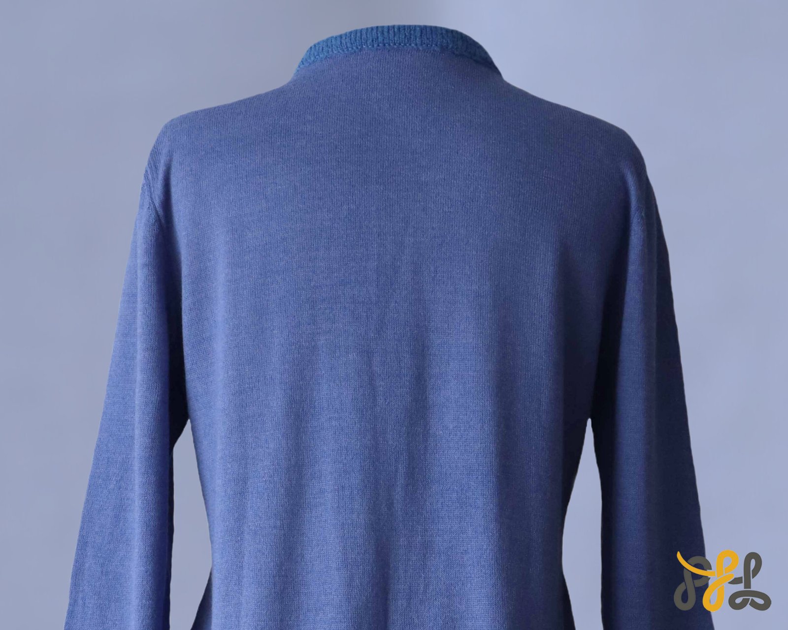 Cardigan baby alpaca, vest with button closure and crew neck color blue. made in Peru by PFL knitwear Cardigan baby alpaca, vest with button closure and crew neck color blue. made in Peru by PFL knitwear
