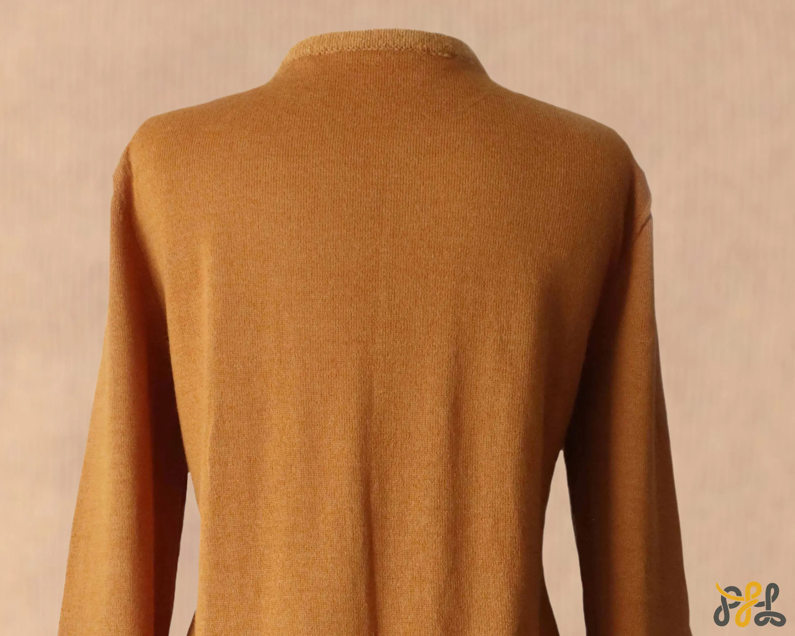 Cardigan baby alpaca, vest with button closure and crew neck color Ochre. made in Peru by PFL knitwear Cardigan baby alpaca, vest with button closure and crew neck color Ochre. made in Peru by PFL knitwear