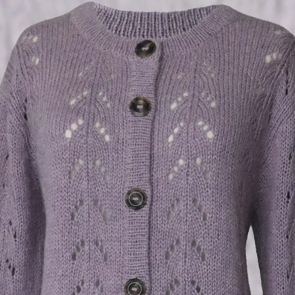 Cardigan baby alpaca, vest with button closure with knitted-in pattern, color Lilac. made in peru by PFL knitwear. Cardigan baby alpaca, vest with button closure with knitted-in pattern, color Lilac. made in peru by PFL knitwear.