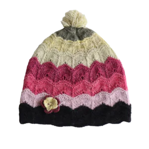 PFLknitwear.com Beanie baby alpaca natural dyed colors with pompom and embroidered flower. Made in Peru